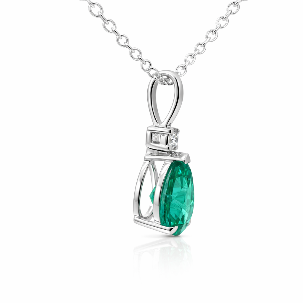 Pear Emerald Pendant with Moissanite Accent